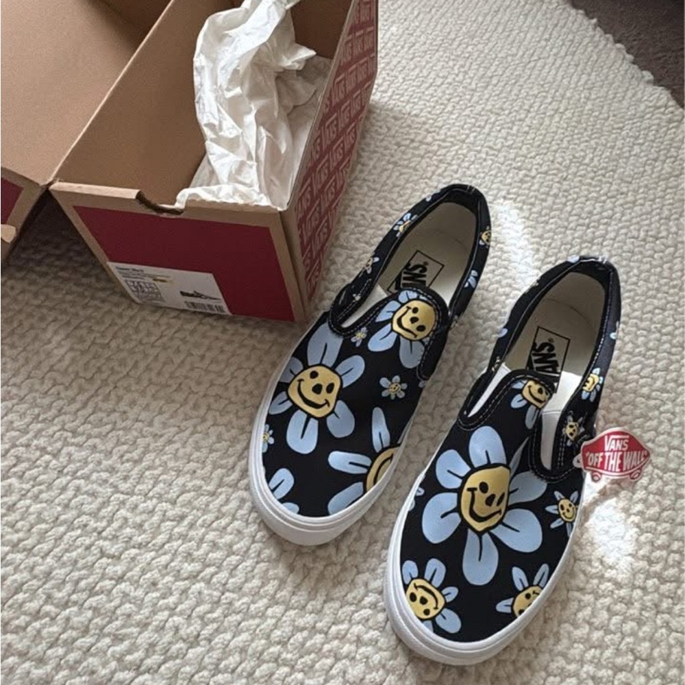 Vans Black Slip-Ons with Smiley Floral Pattern